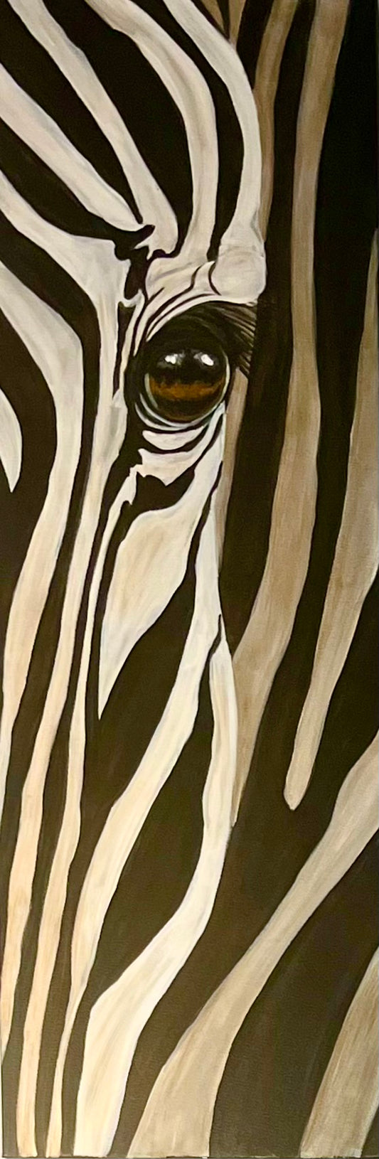 36” by 12” acrylic on gallery wrapped canvas with a front view of a zebra's eye. Original by Terrinye