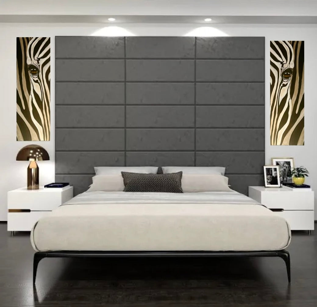 A high head board with two Zebra Eye painting on each side for an original dramatic effect in this minimalist bedroom.